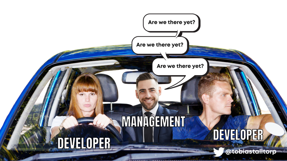 Developers driving with management in the back seat
